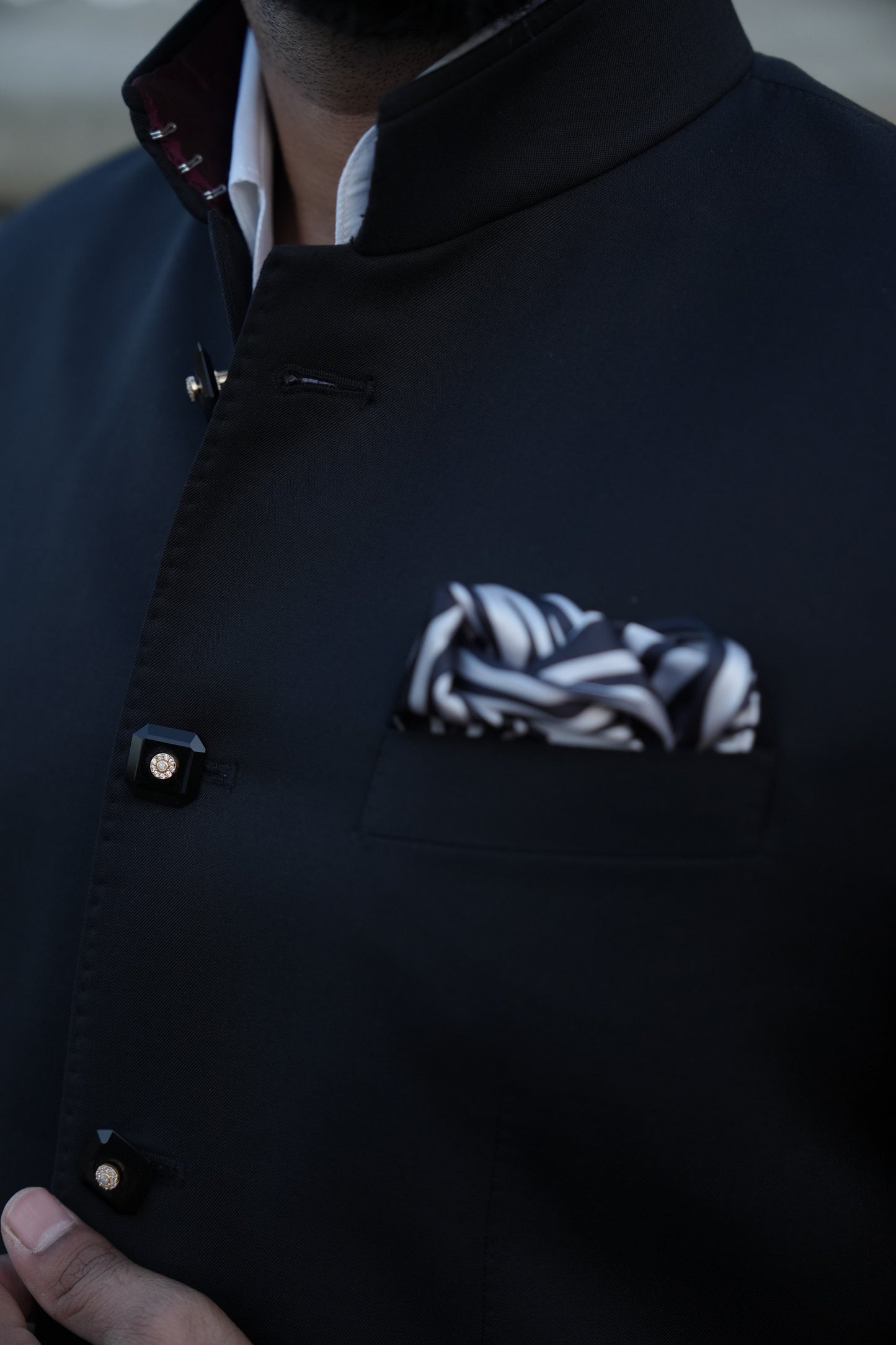 Hand stitched black bandhgala suit